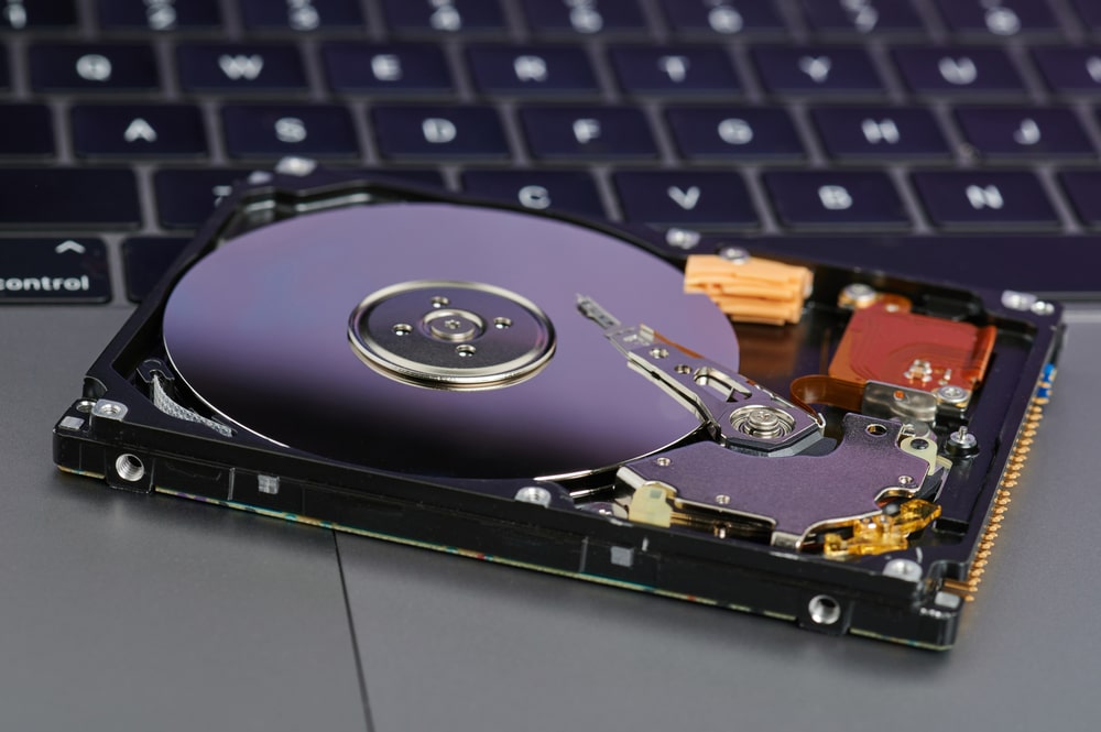 A view of a hard disk placed on a laptop