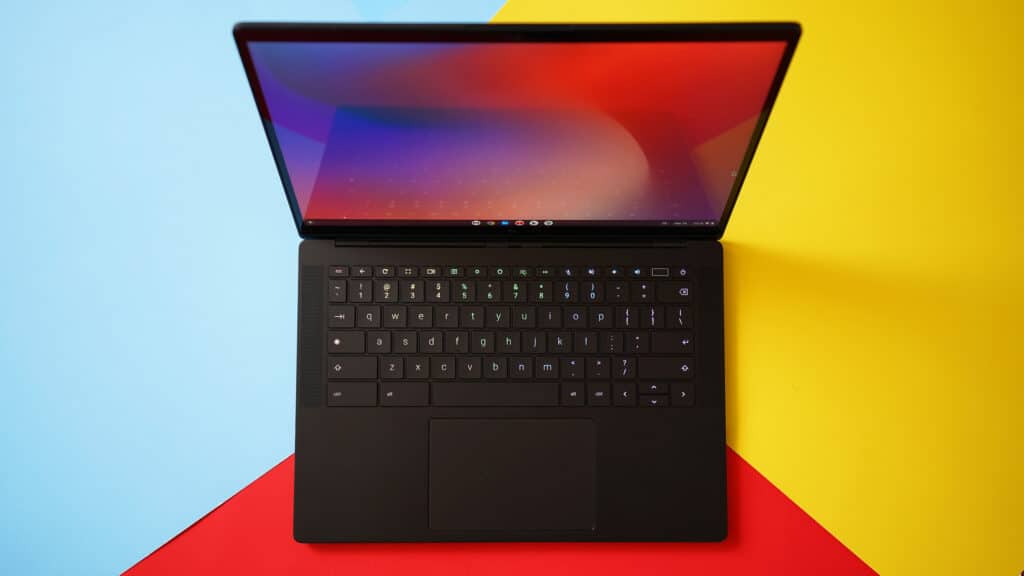 A top view of HP Dragonfly Pro Chromebook with a colorful background