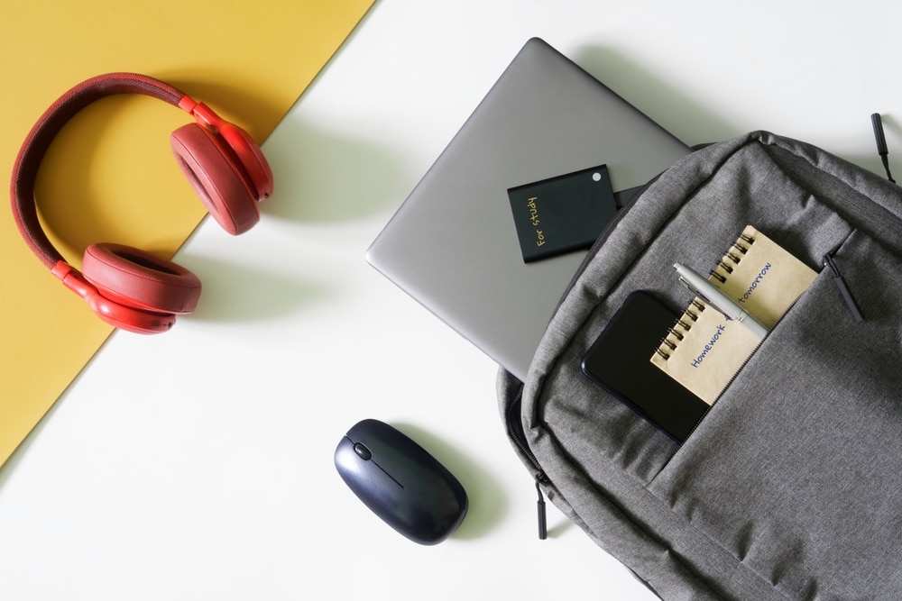 An overhead of a laptop inside a laptop bag