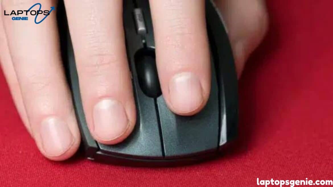 a person holding a wireless laptop mouse in his hand png x webp