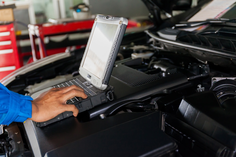 Mechanic Using Diagnostic Machine Tools Ready To Be Used With